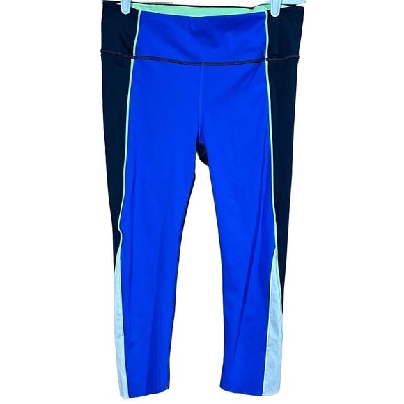 Women's Athleta Velocity Black Blue Color Block Stash Pocket Capri leggings Gym - Picture 1 of 7